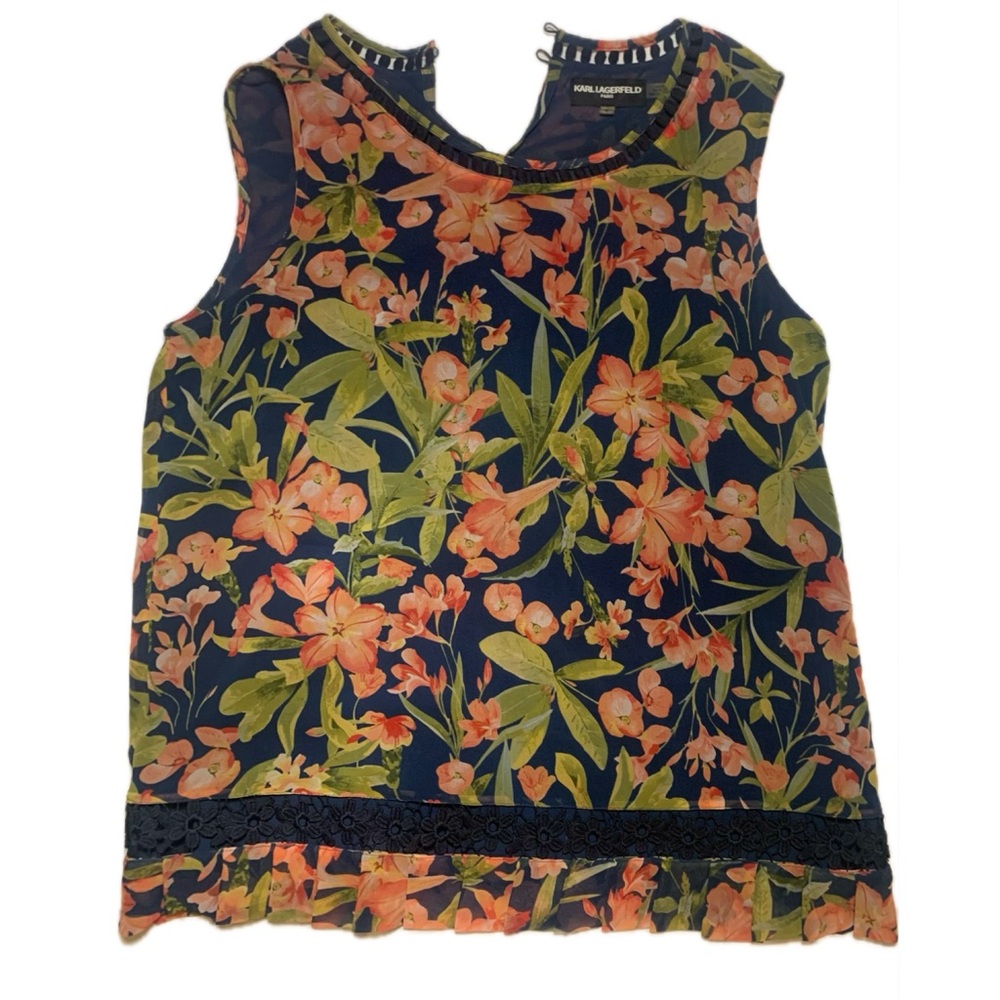 Bright floral top with exquisite details, by Karl Lagerfield. Size medium.
